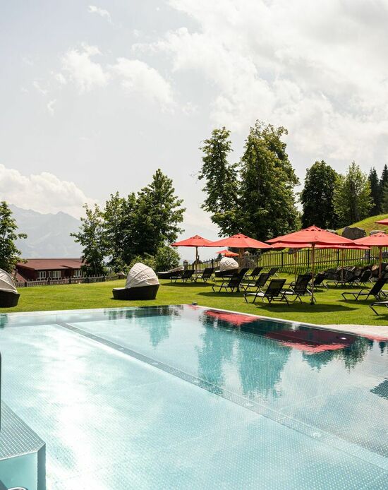 Außenpool – Kinderhotel Allgäuer Berghof  Außenpool im Kinderhotel Allgäuer Berghof